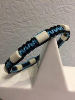 EM-Keramik Halsband in neon turguise und schwarz.